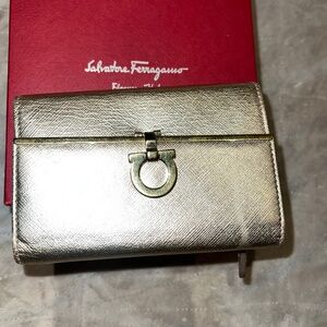 Salvatore Ferragamo metallic gold wallet
